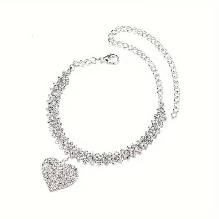Pulsera con dije de corazón de diamantes de imitación