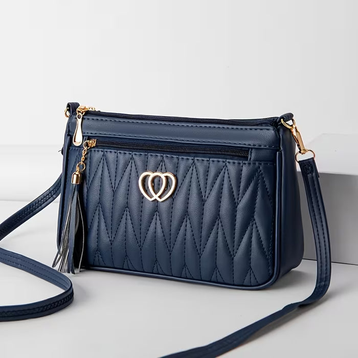 Bolso de hombro elegante, cruzado acolchado con detalle de corazón