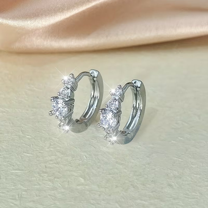 Aretes de aro de cobre de lujo elegante con incrustaciones de circonita