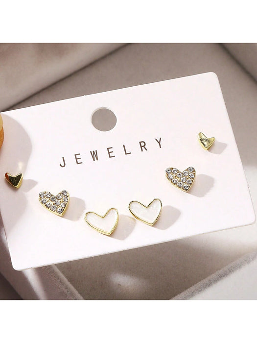 SHEIN 3 Pares de Aretes blancos con forma de corazón de estilo creativo y simple