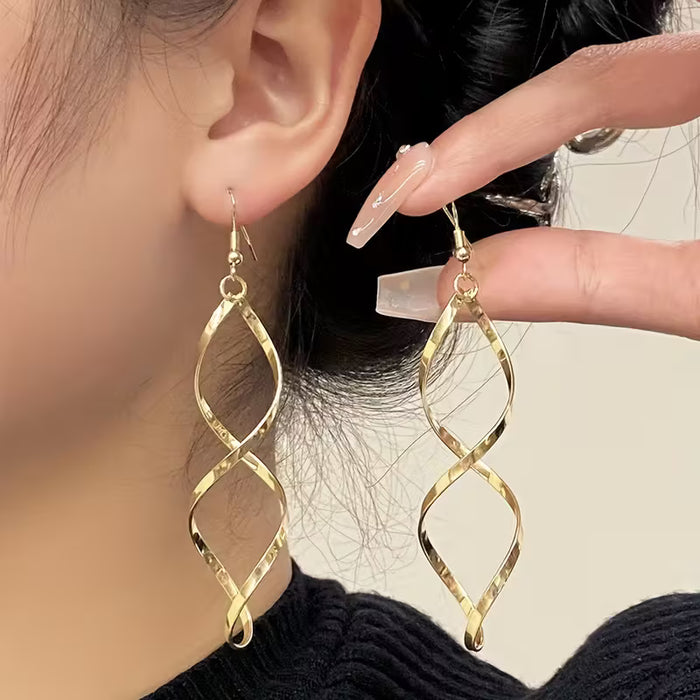 Pendientes de mujer ,diseño individual y original en espiral y onda curva