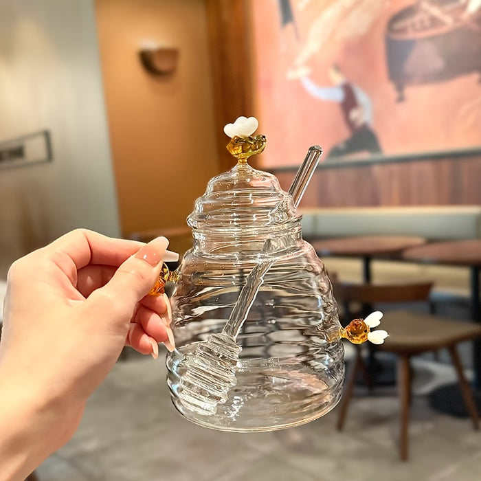 1 pza. Tarro de miel elegante con temática de abeja y cucharilla integrada de vidrio