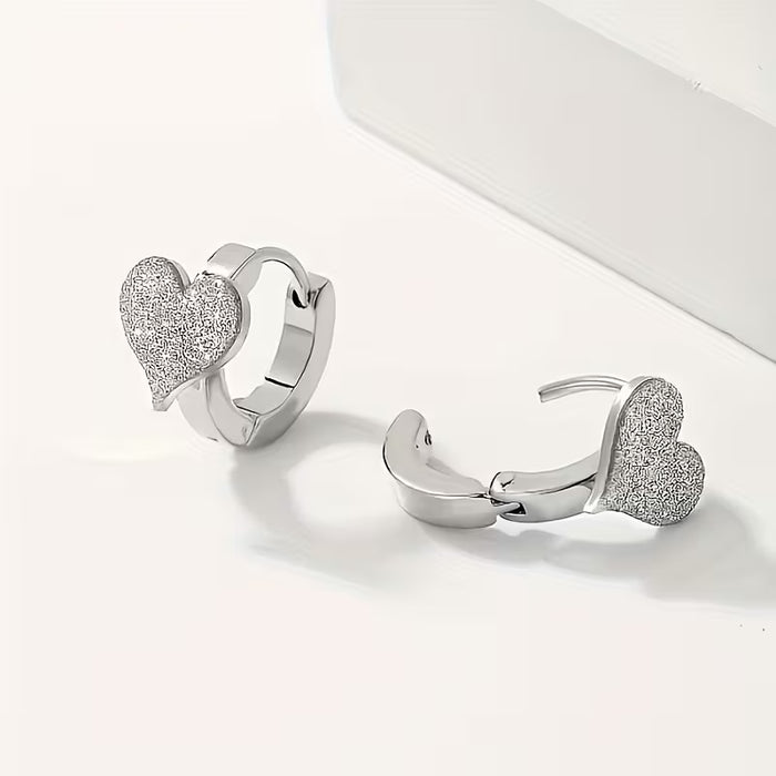 1 par de aretes mate en forma de corazón para mujer