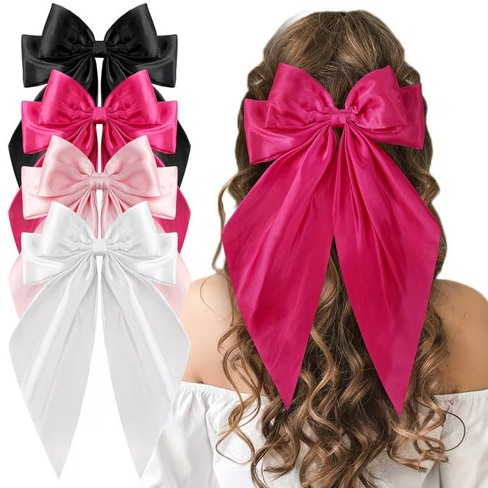 Un set de cuatro diademas de satén grandes y extra grandes con un estilo de clip, lindas adornos para el cabello