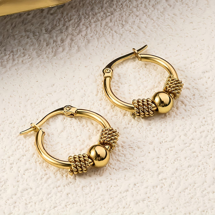 Un par de aretes de acero inoxidable vintage de moda para mujer