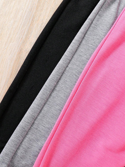 SHEIN Conjunto de 3 leggings deportivos para niñas con estampado floral, de corazones y letras