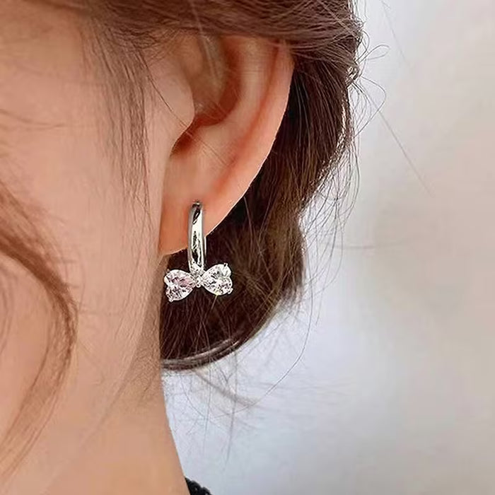 Aretes con diseño de corazón y lazo para mujer, exquisito con incrustaciones de circonita