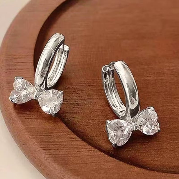 Aretes con diseño de corazón y lazo para mujer, exquisito con incrustaciones de circonita
