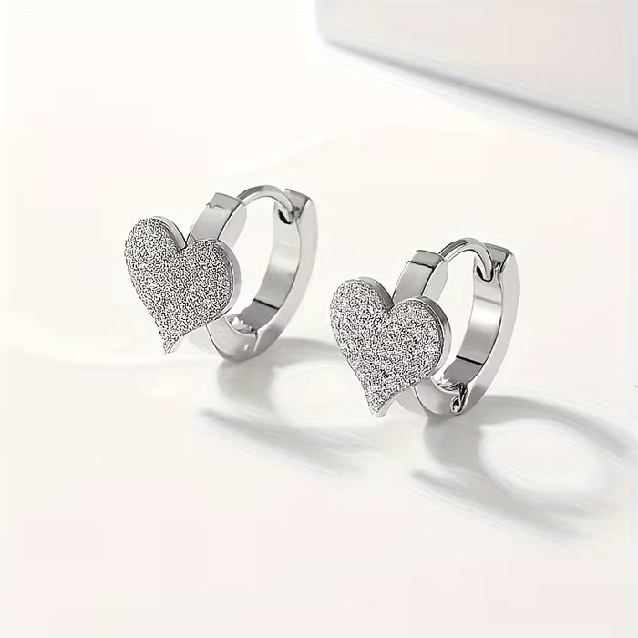 1 par de aretes mate en forma de corazón para mujer