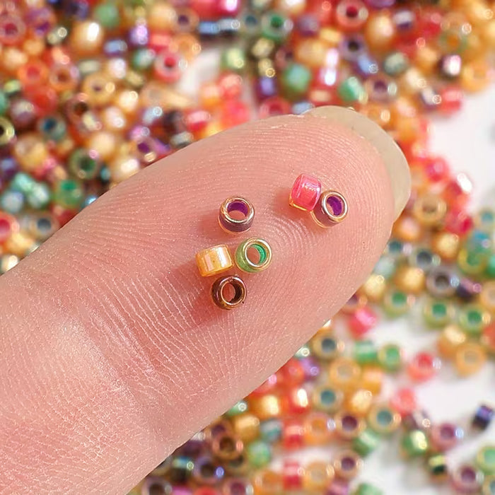 2700 piezas de cuentas de semillas cilíndricas brillantes doradas - 2,5 mm de diámetro