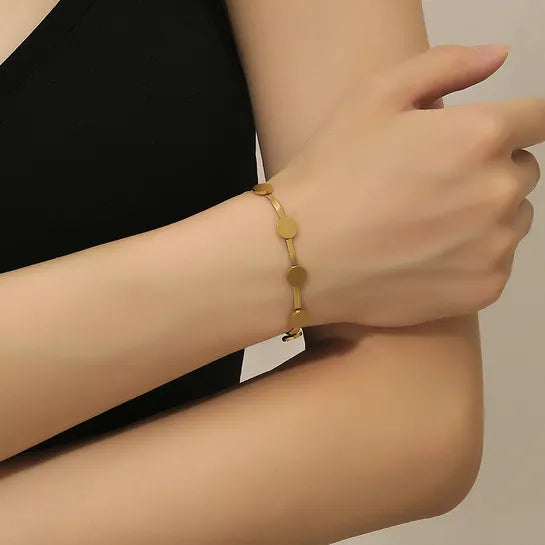 Pulsera sencilla y elegante de Discos Pequeños