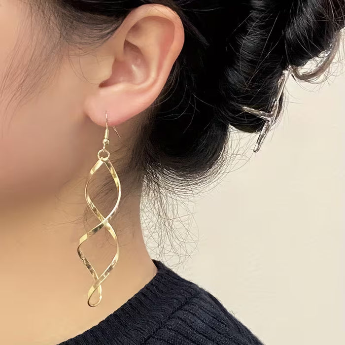 Pendientes de mujer ,diseño individual y original en espiral y onda curva