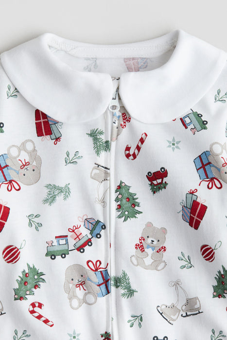 H&M Mono pijama con cuello para bebe con estampado navideño