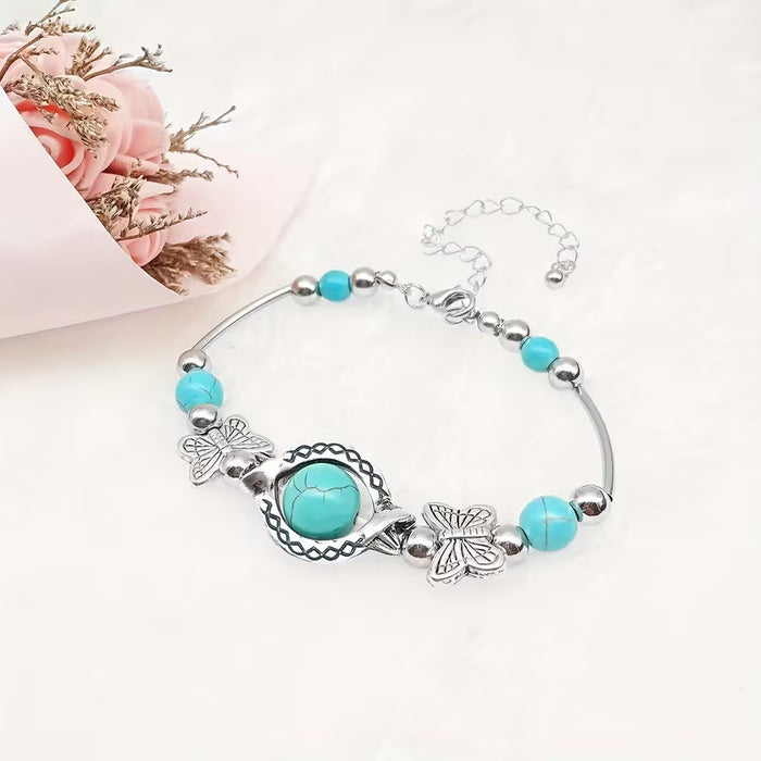 Pulsera turquesa vintage hecha a mano, cuentas de la suerte de mariposa