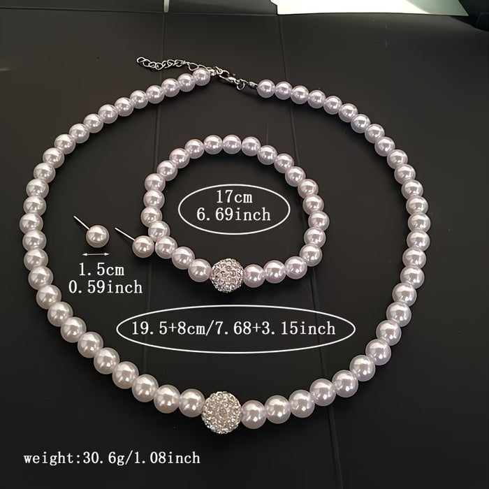 Conjunto de collar de perlas sintéticas, una pulsera y un par de aretes