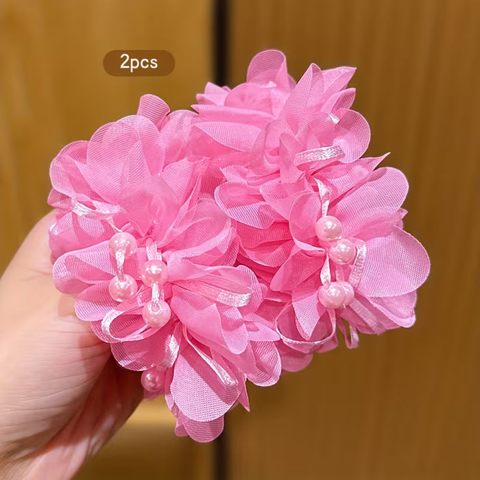 Dos coleteros de pelo con flores rosas de alta elasticidad