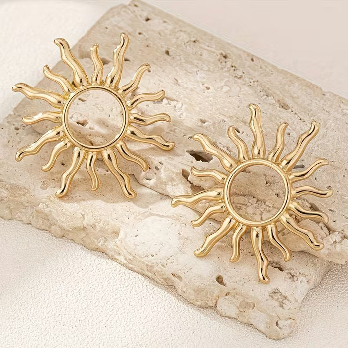 Un par de elegantes aretes de girasol para mujer - Diseño vintage de pétalo dorado