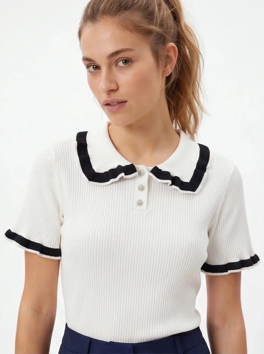 Zara Polo minimalista de algodón egipcio para una silueta llamativa