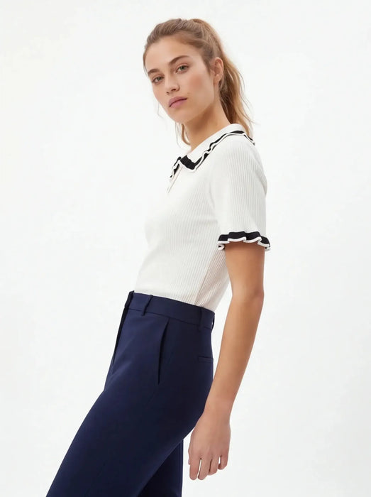 Zara Polo minimalista de algodón egipcio para una silueta llamativa