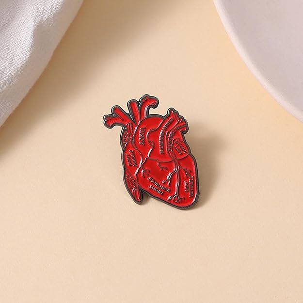 Shein Broche de solapa de metal con forma de corazón anatómico para ropa