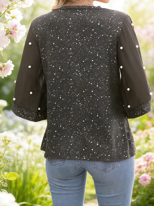 Camiseta de mujer moderna y elegante con láminas brillantes y mangas de perlas