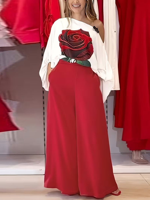 Un conjunto que incluye un top holgado con hombros descubiertos, estampado de rosas y mangas tipo farol