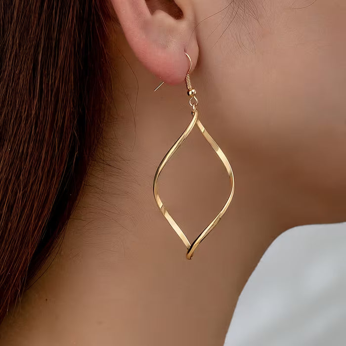 2 de aretes de mujer con forma de calabaza de metal hueca, ondulada y curva