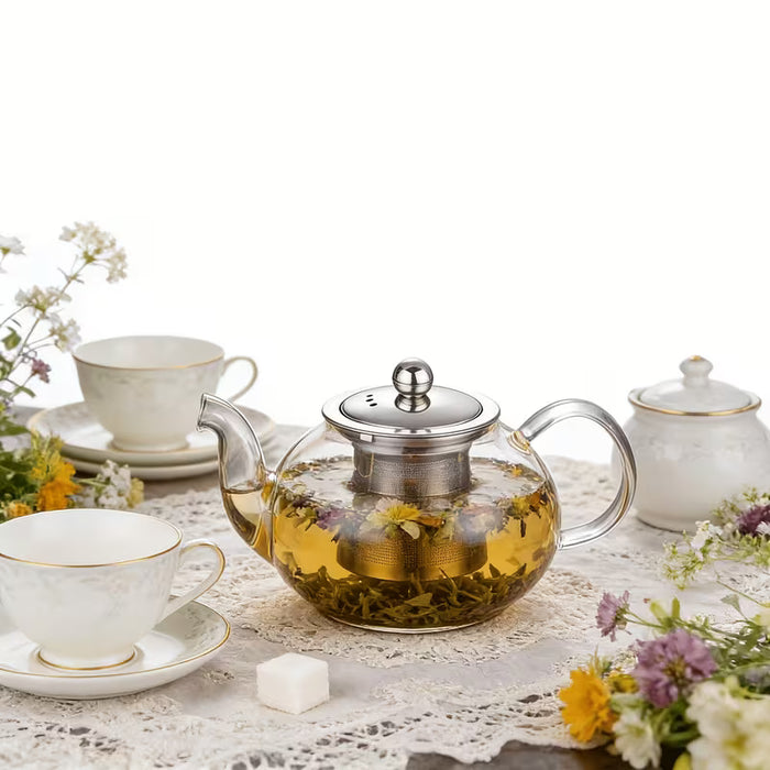 Tetera de vidrio transparente con colador de té y tapa, ideal para preparar té en casa