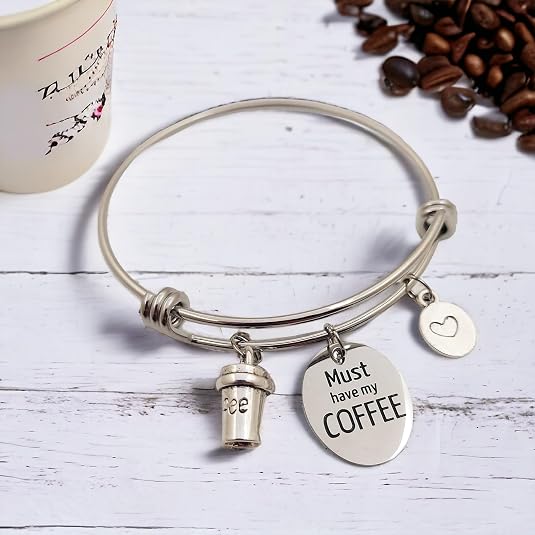 Pulsera extensible de acero inoxidable con dije de café imprescindible