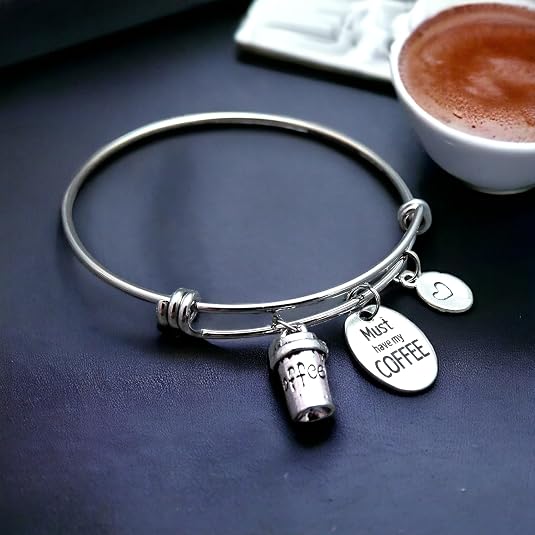 Pulsera extensible de acero inoxidable con dije de café imprescindible