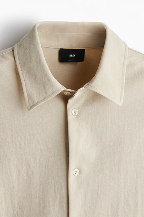 H&M Camisa de corte holgado de color solido