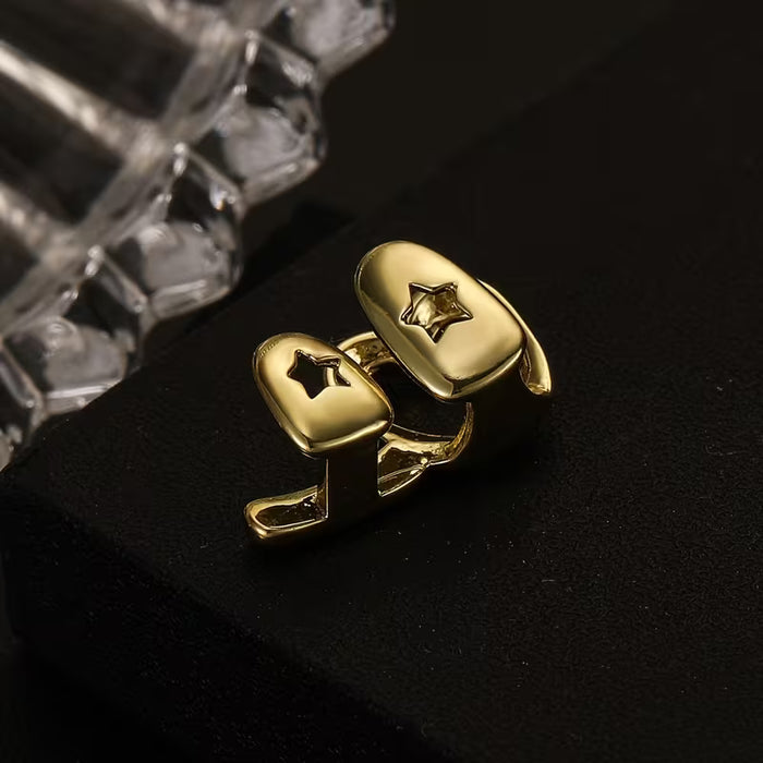 Shein Grillz de cobre en forma de corazón con diseño de rayas de amor huecas, acabado dorado