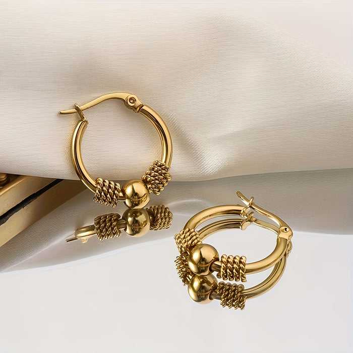 Un par de aretes de acero inoxidable vintage de moda para mujer