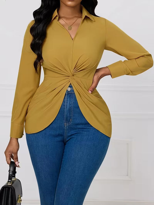 Elegante camisa de manga larga para mujer en un color sólido con diseño de pliegue