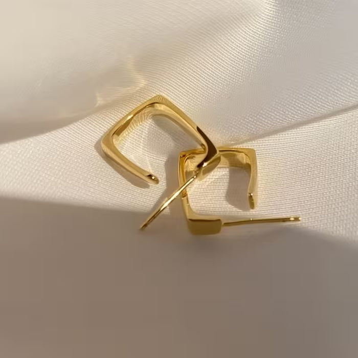 Pendientes de botón minimalistas de superficie geométrica para mujer