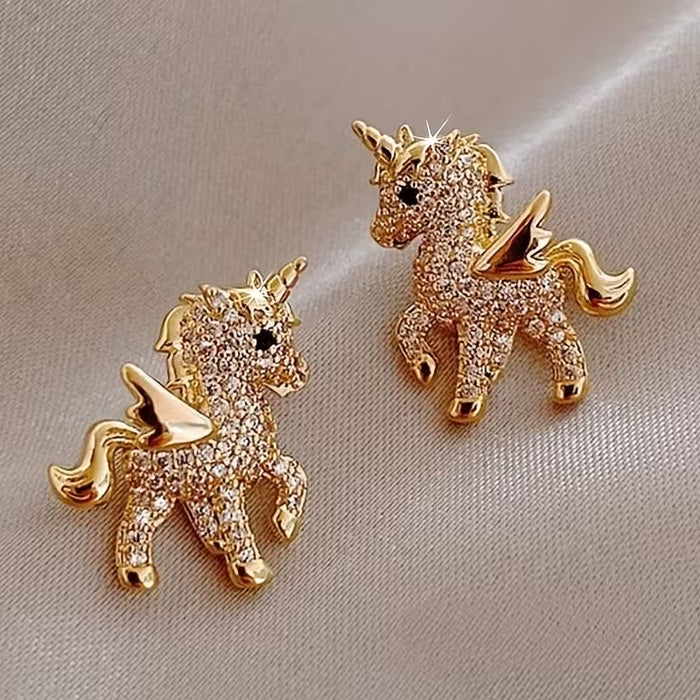 Pendientes de dije de unicornio con pedrería |únicas y elegantes