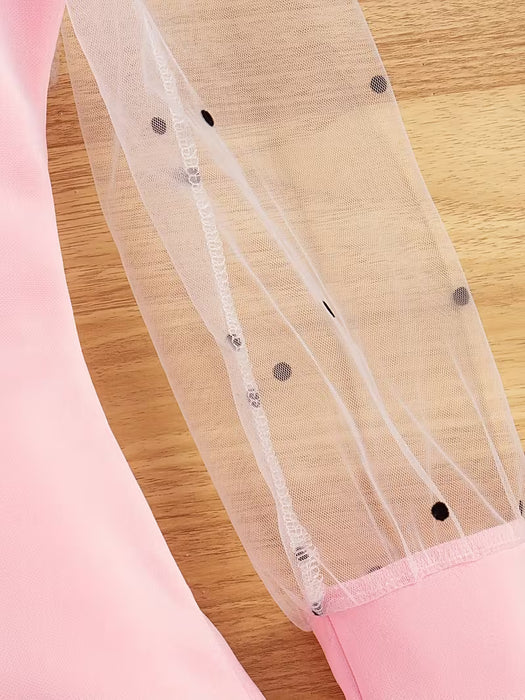 Un elegante vestido de manga larga para niñas, cuello y combinación de malla