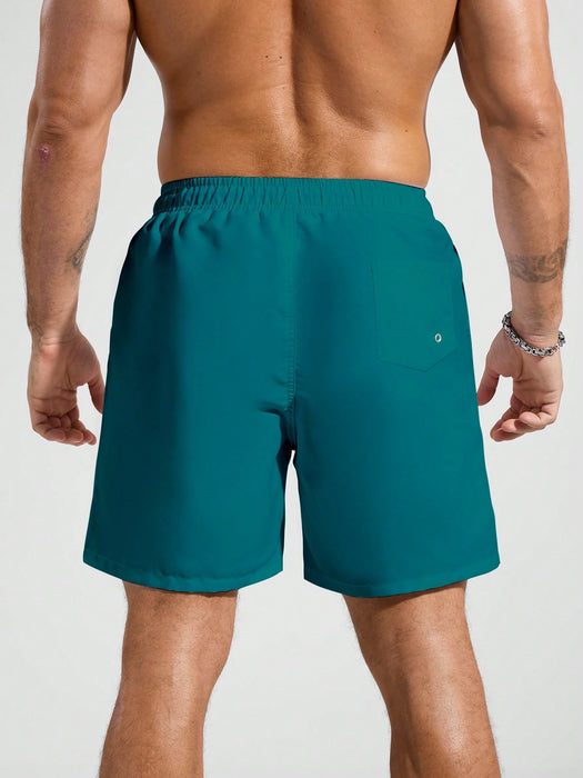 SHEIN Pantalones cortos de playa holgados y relajados con cordón para hombre