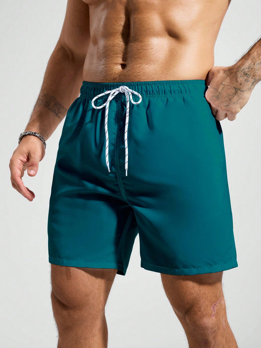 SHEIN Pantalones cortos de playa holgados y relajados con cordón para hombre