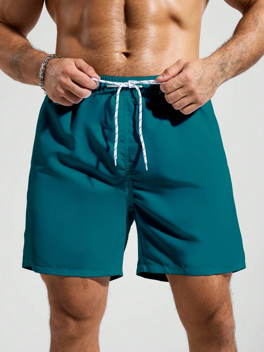 SHEIN Pantalones cortos de playa holgados y relajados con cordón para hombre