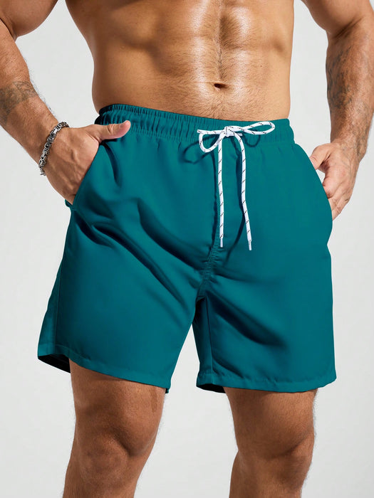 SHEIN Pantalones cortos de playa holgados y relajados con cordón para hombre