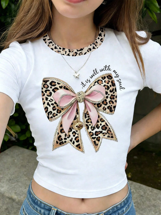 SHEIN Camiseta de cuello redondo de manga corta con estampado de lazo rosa