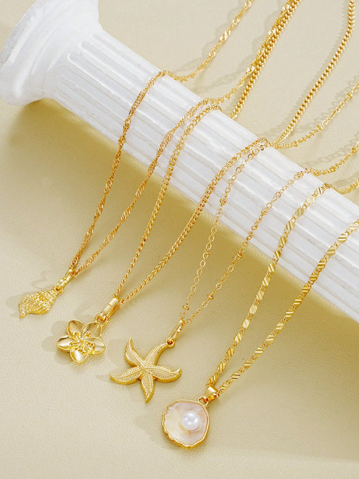 SHEIN Conjunto de 4 piezas de collar colgante con elementos de concha, estrella de mar y flor de perla
