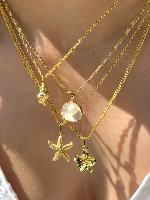 SHEIN Conjunto de 4 piezas de collar colgante con elementos de concha, estrella de mar y flor de perla