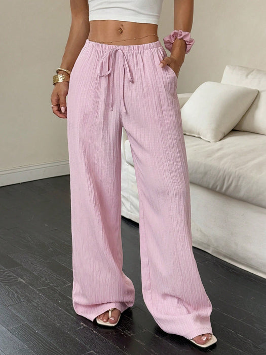 SHEIN Flirla Pantalones anchos con bolsillos y cintura ajustable de color liso para mujer