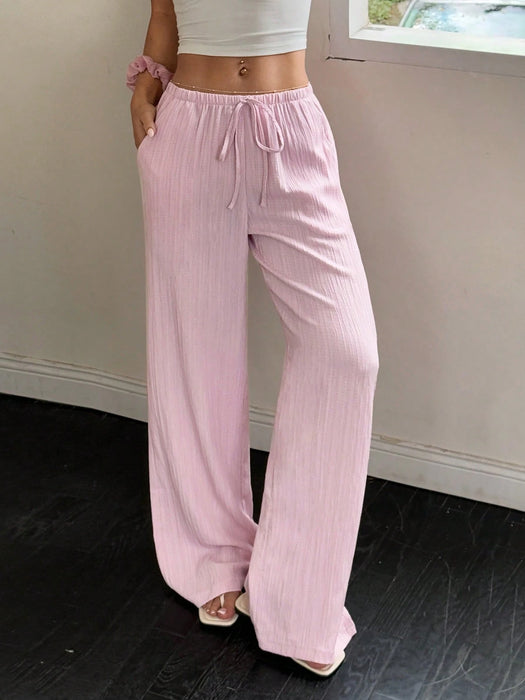 SHEIN Flirla Pantalones anchos con bolsillos y cintura ajustable de color liso para mujer