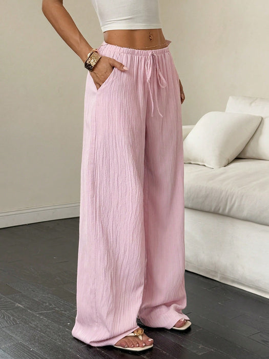 SHEIN Flirla Pantalones anchos con bolsillos y cintura ajustable de color liso para mujer