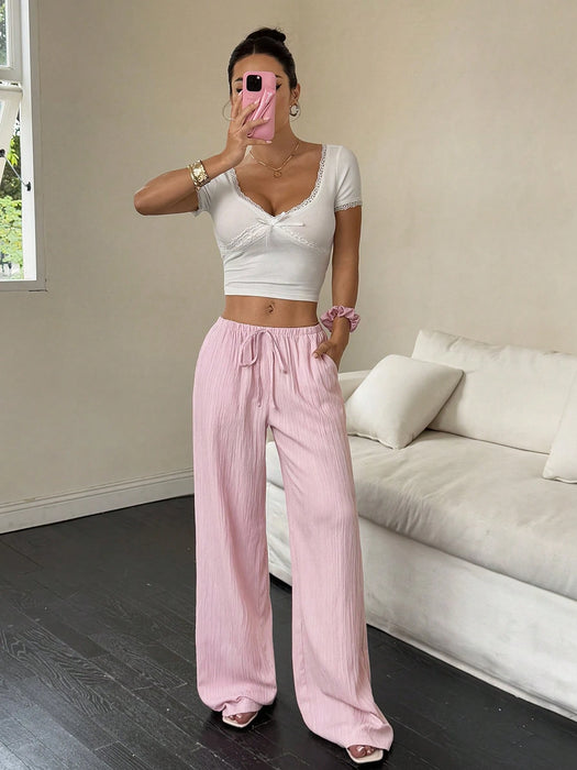 SHEIN Flirla Pantalones anchos con bolsillos y cintura ajustable de color liso para mujer