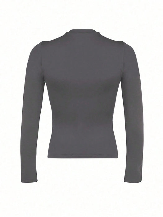 Shein INAWLY Camiseta casual de manga larga y cuello redondo lisa para mujer