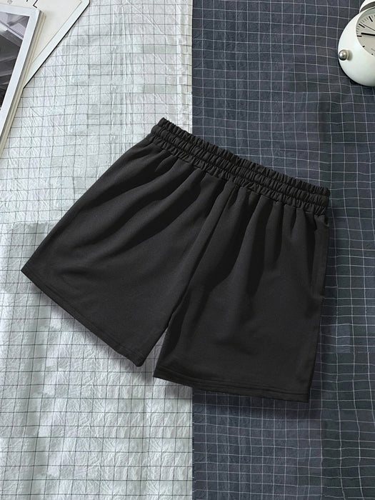 Manfinity Roghcode Pantalones cortos con estampado de rosas, para hombres